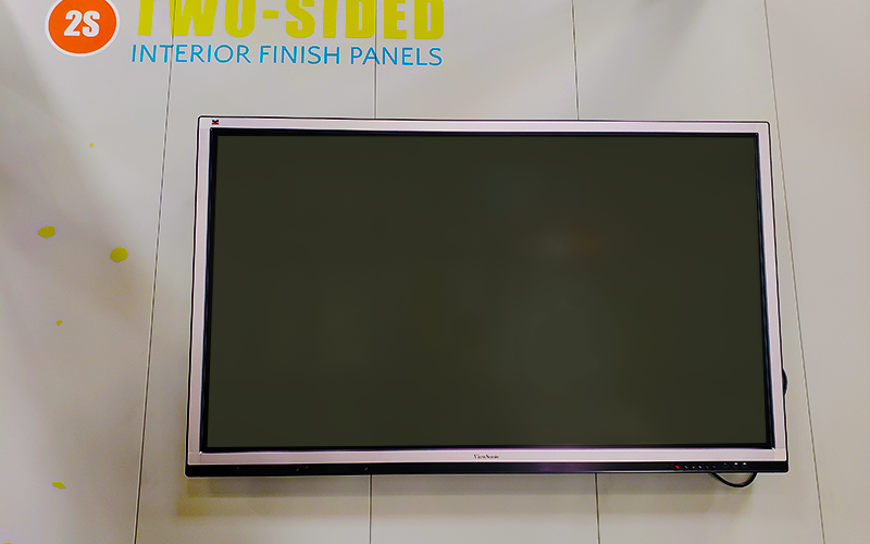 TV Mounted on Metal Wall Panels
